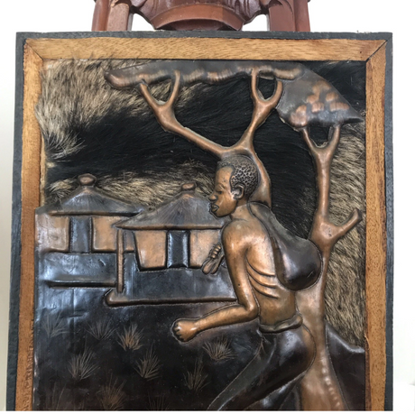 African Man Walking to Work In Copper Frame