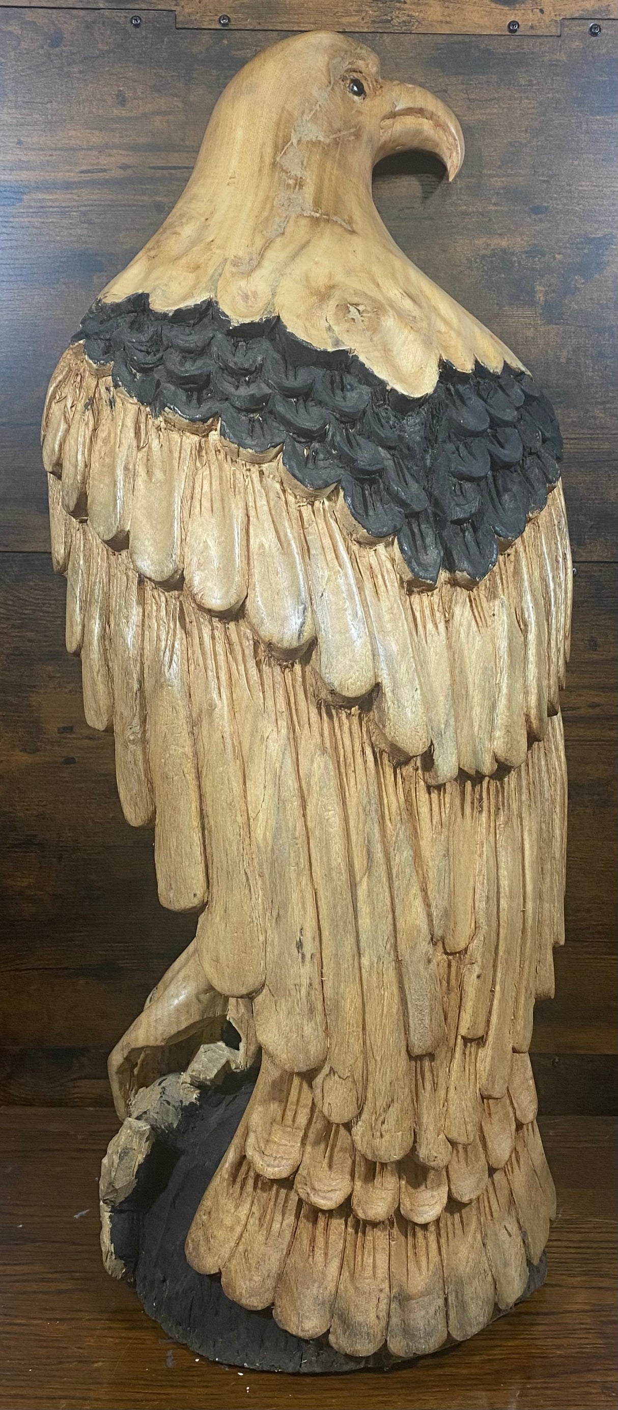 Beautifully Carved Bald Eagle Perched on Stone with a Trapped Fish