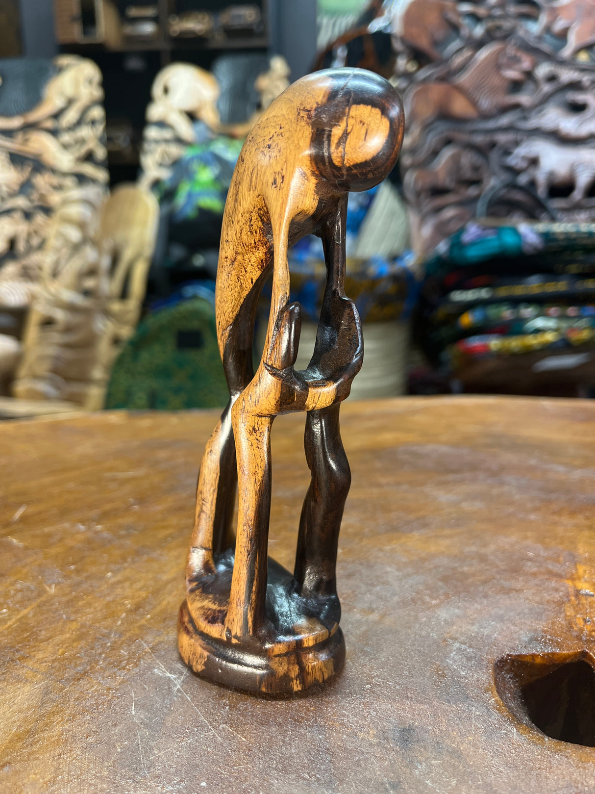 Small Hand Carved Wooden Family Abstract Parent and Two Children Ebony