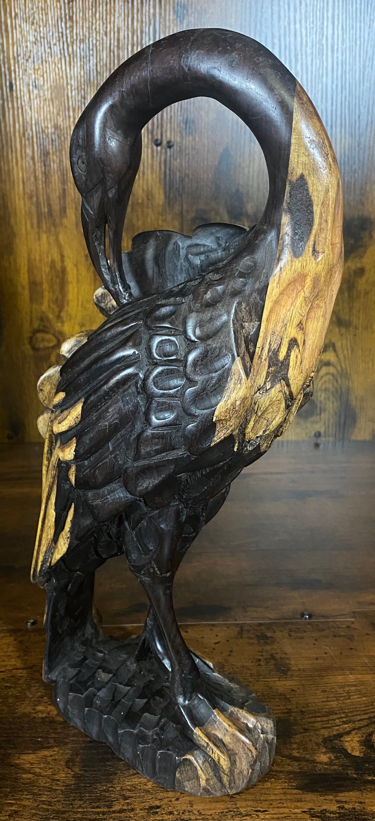 Hand Carved Stressed Bird Plucking Feathers from its Back