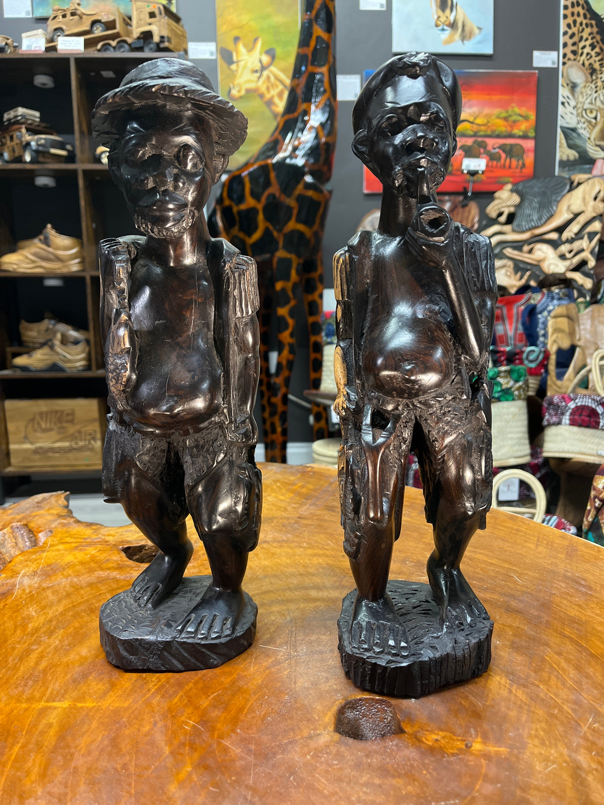Pair of Ebony Hand Carved Fisherman