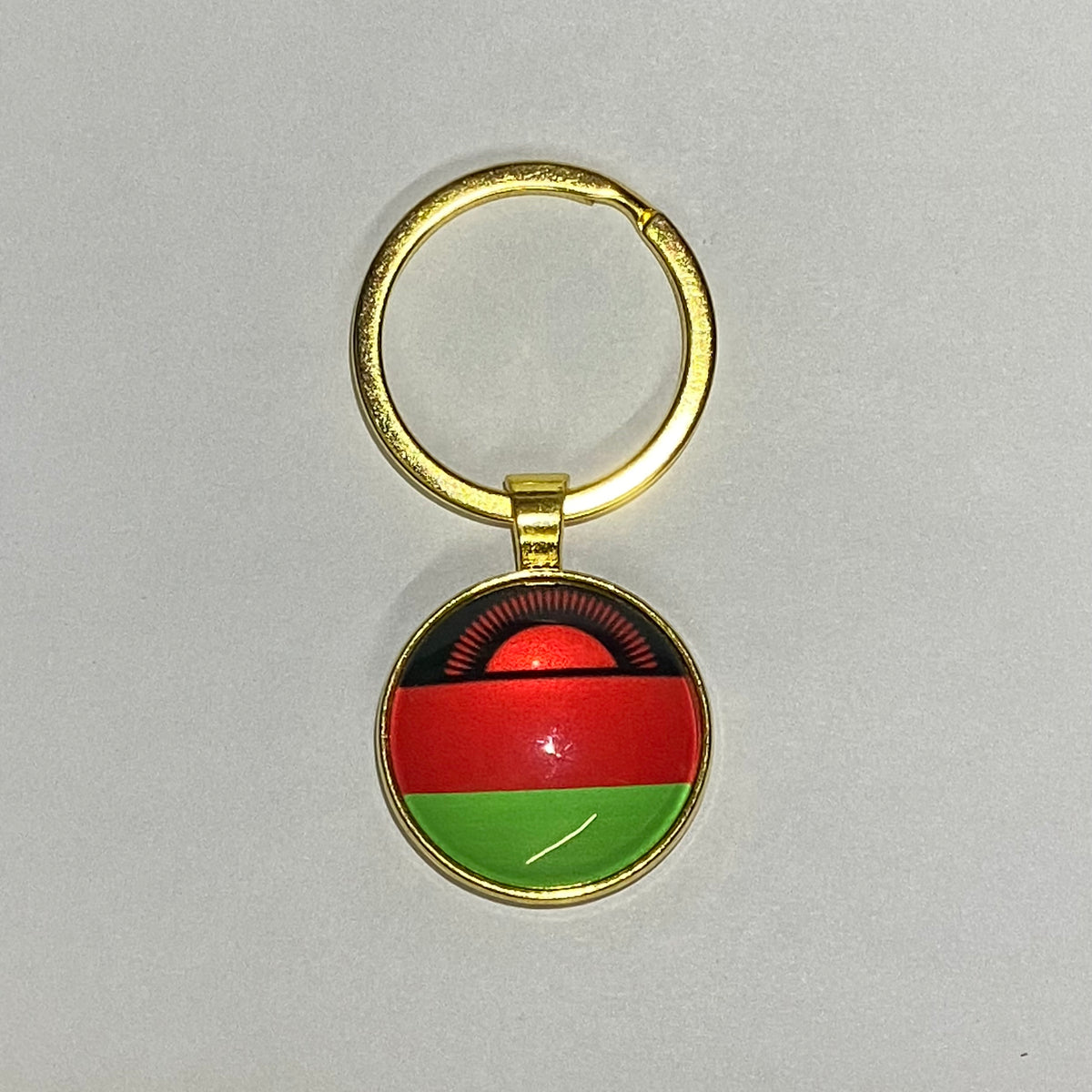 National Flag Round Flat Glass Gold Keychain – Africas Finest