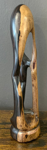 Wooden Mother Breaking Up a Fight Between Siblings