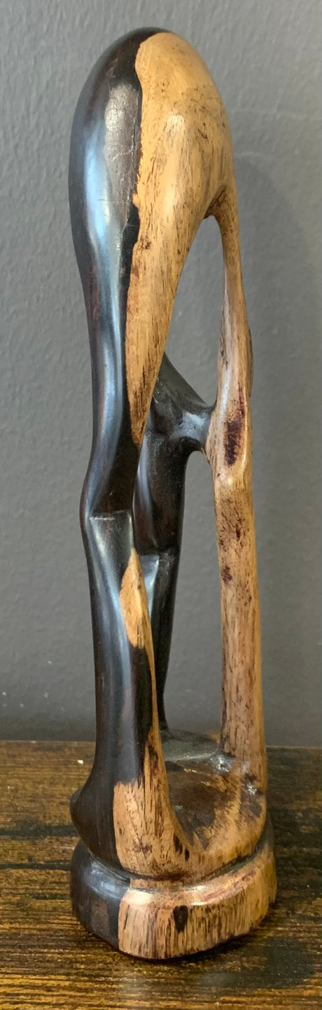 Wooden Mother Breaking Up a Fight Between Siblings