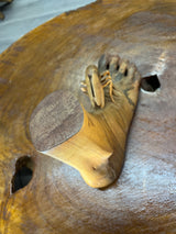 Carved Sculpture of a Mosquito Biting on a Foot