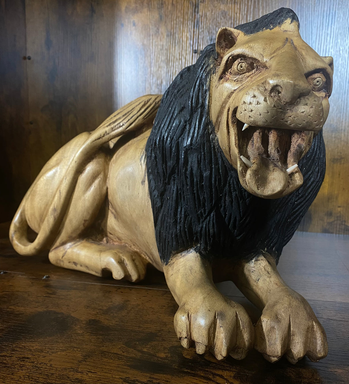 Hand Carved Resting Lion with a Warning Growl