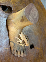 Carved Sculpture of a Mosquito Biting on a Foot