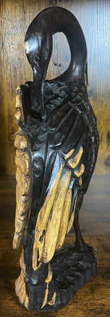 Hand Carved Stressed Bird Plucking Feathers from its Back