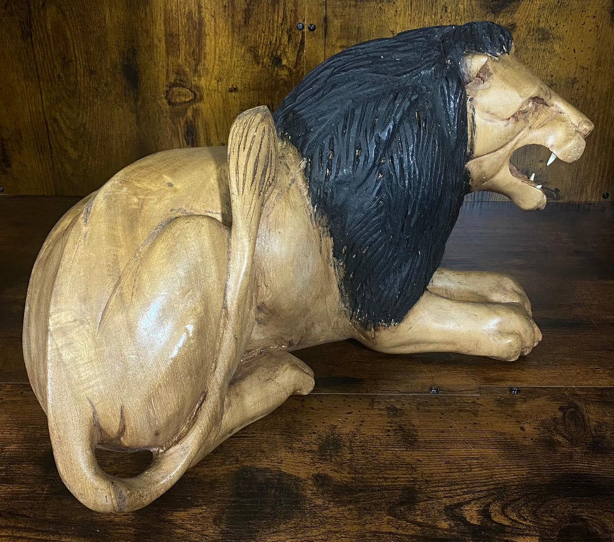 Hand Carved Resting Lion with a Warning Growl