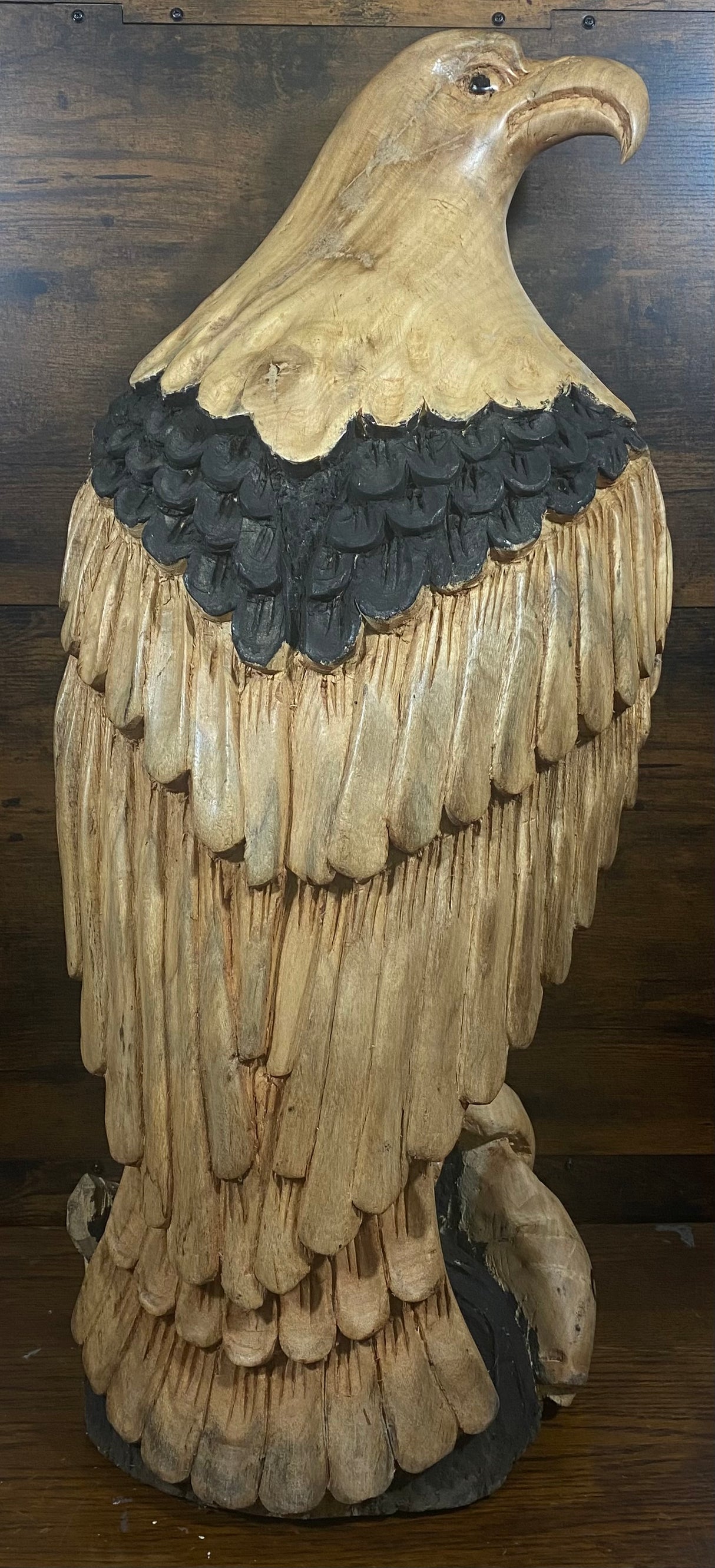 Beautifully Carved Bald Eagle Perched on Stone with a Trapped Fish