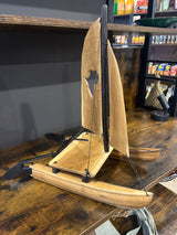 Intricately Hand Carved Wooden Catamaran with ‘Africa’ Sail
