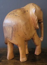 Wooden Standing Elephant without Tusks and Trunk Down