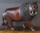Ebony Head Turned Lion with Textured Mane