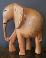Wooden Standing Elephant without Tusks and Trunk Down